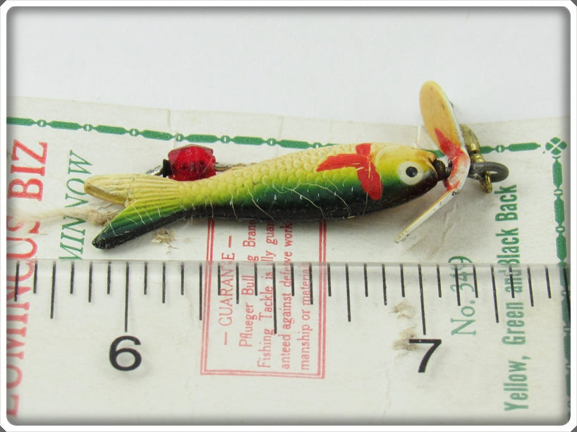 do luminous fishing lures work Pflueger Luminous Biz Minnow On Card 3499 Yellow Green And Black Back