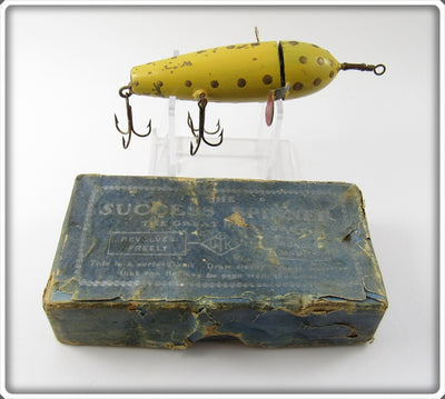 The Success Spinner Yellow Rotary Head In Blue Box